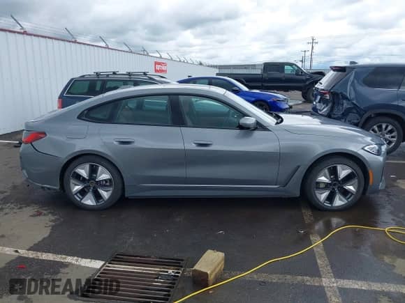 2023 BMW i4 eDrive35 with VIN WBY43AW04PFP57379, listed as a IAAI auction lot 42235595 with 12,934 mi miles and . Bid and sale history available at DreamBid. Image 13.