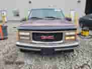 1996 GMC Sierra 1500 z VIN 2GTEC19R8T1529807, wystawiony jako Copart lot #66665385 z przebiegiem 162 241 mil mil oraz Nie do naprawy • Non repairable. Historia ofert i sprzedaży dostępna na DreamBid. Obrazek 5.