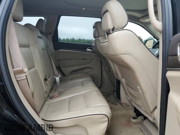 2017 Jeep Grand Cherokee Overland with VIN 1C4RJFCG8HC940430, listed as a Copart auction lot 68780995 with 150,371 mi miles and Salvage title. Bid and sale history available at DreamBid. Image 11.