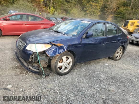 2009 Hyundai Elantra GLS z VIN KMHDU46D89U694364, wystawiony jako Copart lot #87024635 z przebiegiem 182 885 mil mil oraz Szkoda całkowita • Salvage title. Historia ofert i sprzedaży dostępna na DreamBid. Obrazek 1.