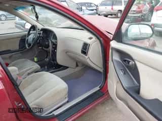 2003 Hyundai Elantra GLS z VIN KMHDN45D23U497616, wystawiony jako IAAI lot #43300982 z przebiegiem 167 833 mil mil oraz . Historia ofert i sprzedaży dostępna na DreamBid. Obrazek 5.