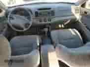 2004 Toyota Camry LE with VIN 4T1BE32K04U291054, listed as a Copart auction lot 81778925 with 164,506 mi miles and Salvage title. Bid and sale history available at DreamBid. Image 8.