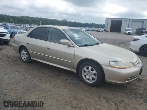 2002 Honda Accord EX with VIN JHMCG660X2C002471, listed as a Copart auction lot 57236995 with 299,618 mi miles and Salvage title. Bid and sale history available at DreamBid. Image 4.