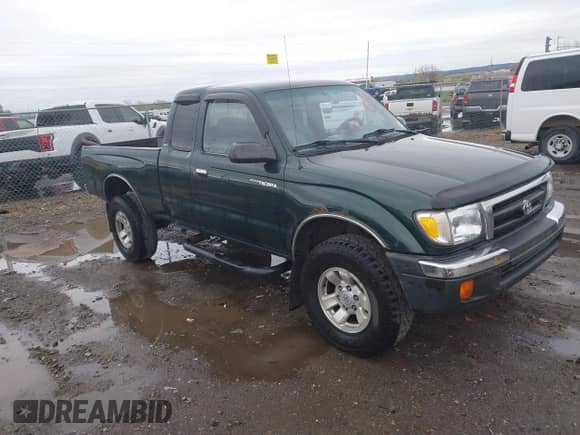 2000 Toyota Tacoma with VIN 4TAWM72N6YZ683194, listed as a IAAI auction lot 42113384 with 174,601 mi miles and . Bid and sale history available at DreamBid. Image 1.