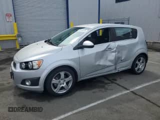 2014 Chevrolet Sonic LTZ with VIN 1G1JE6SB5E4131294, listed as a Copart auction lot 80164615 with 69,644 mi miles and Salvage title. Bid and sale history available at DreamBid. Image 1.