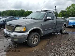 2002 Ford F-150 XL with VIN 2FTRF18W52CA50943, listed as a Copart auction lot 62456605 with Not provided miles and Salvage title. Bid and sale history available at DreamBid. Image 1.