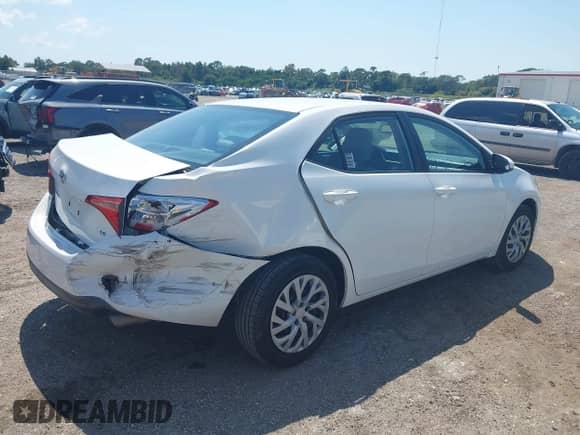 2019 Toyota Corolla L with VIN 2T1BURHE5KC230711, listed as a IAAI auction lot 43261314 with 88,638 mi miles and . Bid and sale history available at DreamBid. Image 4.