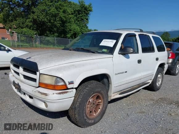 1999 Dodge Durango z VIN 1B4HS28Z7XF506442, wystawiony jako IAAI lot #42611396 z przebiegiem 200 467 mil mil oraz . Historia ofert i sprzedaży dostępna na DreamBid. Obrazek 6.