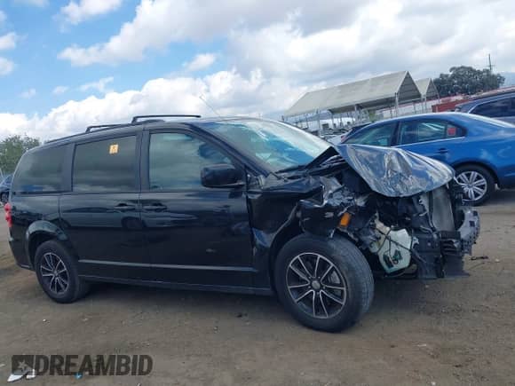 2019 Dodge Grand Caravan GT with VIN 2C4RDGEG8KR562781, listed as a IAAI auction lot 43376310 with 127,974 mi miles and . Bid and sale history available at DreamBid. Image 13.