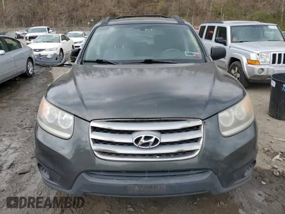 2012 Hyundai Santa Fe GLS z VIN 5XYZG3AB6CG126575, wystawiony jako Copart lot #49643314 z przebiegiem Nie podano mil oraz Czysty tytuł • Clean title. Historia ofert i sprzedaży dostępna na DreamBid. Obrazek 5.