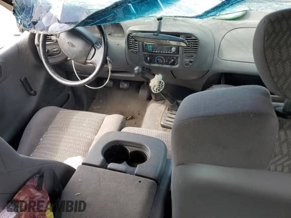 2002 Ford F-150 XL z VIN 1FTRX17252NB07504, wystawiony jako Copart lot #80520035 z przebiegiem Nie podano mil oraz Szkoda całkowita • Salvage title. Historia ofert i sprzedaży dostępna na DreamBid. Obrazek 8.