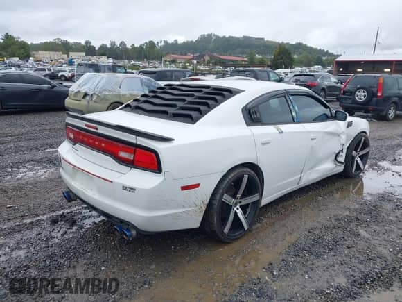 2012 Dodge Charger SE z VIN 2C3CDXBG2CH297295, wystawiony jako IAAI lot #43344494 z przebiegiem 206 149 mil mil oraz . Historia ofert i sprzedaży dostępna na DreamBid. Obrazek 4.