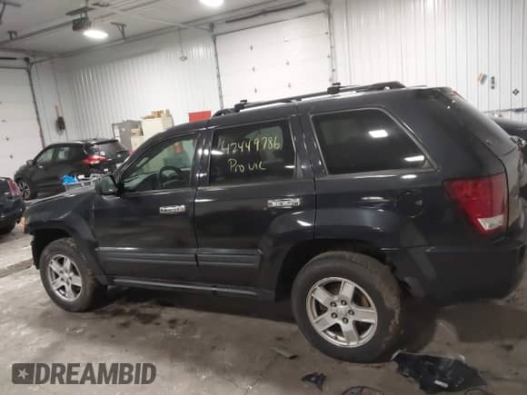 2005 Jeep Grand Cherokee Laredo with VIN 1J4HS48N35C658626, listed as a IAAI auction lot 42449786 with Not provided miles and . Bid and sale history available at DreamBid. Image 14.