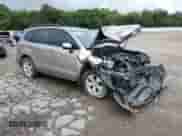 2014 Subaru Forester Touring with VIN JF2SJAMC8EH500918, listed as a Copart auction lot 70511065 with 118,054 mi miles and Salvage title. Bid and sale history available at DreamBid. Image 4.