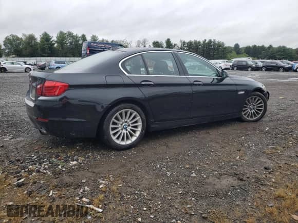 2013 BMW 5 Series 535i xDrive with VIN WBAFU7C53DDU77189, listed as a Copart auction lot 80950105 with 80,560 mi miles and Salvage title. Bid and sale history available at DreamBid. Image 3.