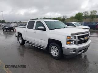 2015 Chevrolet Silverado 1500 LT z VIN 3GCUKREC2FG279622, wystawiony jako IAAI lot #42578983 z przebiegiem 164 934 mil mil oraz . Historia ofert i sprzedaży dostępna na DreamBid. Obrazek 1.