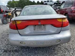 2001 Saturn SC с VIN 1G8ZP12851Z215716, выставлен на аукционе Copart как лот 69665754 с пробегом Не указан миль и Списание • Salvage title. История ставок и продаж доступна на DreamBid. Изображение 6.