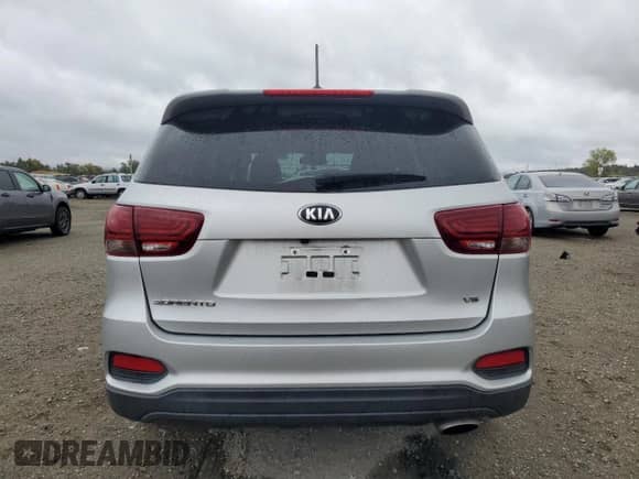 2020 Kia Sorento LX с VIN 5XYPGDA53LG610162, выставлен на аукционе Copart как лот 84770745 с пробегом 99 763 миль миль и Списание • Salvage title. История ставок и продаж доступна на DreamBid. Изображение 6.