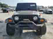 1997 Jeep Wrangler Sport with VIN 1J4FY19S1VP496609, listed as a Copart auction lot 69605495 with 188,432 mi miles and Salvage title. Bid and sale history available at DreamBid. Image 5.