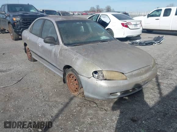 1997 Hyundai Elantra z VIN KMHJF24M3VU424442, wystawiony jako IAAI lot #41675970 z przebiegiem 116 809 mil mil oraz . Historia ofert i sprzedaży dostępna na DreamBid. Obrazek 6.