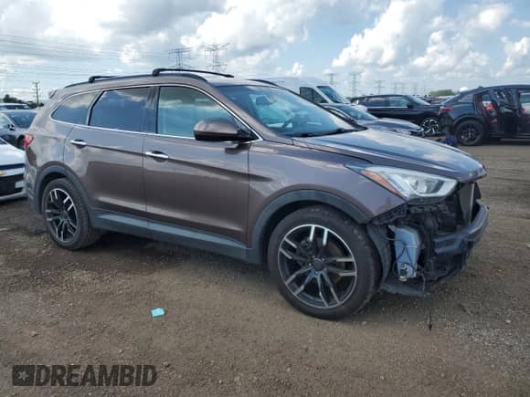 2015 Hyundai Santa Fe GLS with VIN KM8SMDHF8FU103340, listed as a Copart auction lot 65676805 with 184,410 mi miles and Salvage title. Bid and sale history available at DreamBid. Image 4.