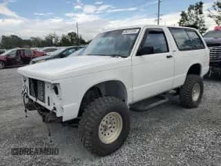 1991 Chevrolet Blazer z VIN 1GNCT18Z5M8105497, wystawiony jako Copart lot #65277335 z przebiegiem 156 219 mil mil oraz Szkoda całkowita • Salvage title. Historia ofert i sprzedaży dostępna na DreamBid. Obrazek 1.