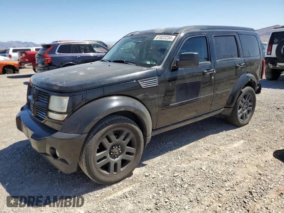 2007 Dodge Nitro R/T with VIN 1D8GT58627W714118, listed as a Copart auction lot 61822234 with 153,959 mi miles and Salvage title. Bid and sale history available at DreamBid. Image 1.