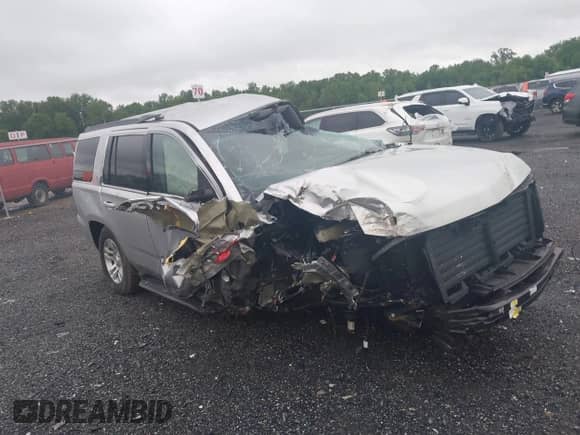 2019 Chevrolet Tahoe LS with VIN 1GNSKAKC2KR185738, listed as a IAAI auction lot 42325196 with Not provided miles and . Bid and sale history available at DreamBid. Image 13.