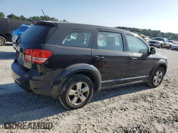 2013 Dodge Journey SE z VIN 3C4PDCAB1DT721733, wystawiony jako Copart lot #69377584 z przebiegiem 130 587 mil mil oraz Szkoda całkowita • Salvage title. Historia ofert i sprzedaży dostępna na DreamBid. Obrazek 3.