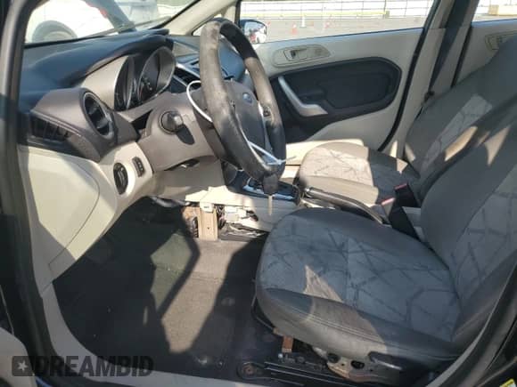 2012 Ford Fiesta SE with VIN 3FADP4BJ7CM155713, listed as a Copart auction lot 69510645 with 94,395 mi miles and Salvage title. Bid and sale history available at DreamBid. Image 7.