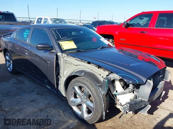 2013 Dodge Charger SXT Plus with VIN 2C3CDXHG5DH696629, listed as a IAAI auction lot 42675341 with 130,194 mi miles and . Bid and sale history available at DreamBid. Image 1.