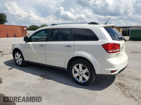 2013 Dodge Journey Crew with VIN 3C4PDDDG5DT682870, listed as a Copart auction lot 69202775 with 158,934 mi miles and Salvage title. Bid and sale history available at DreamBid. Image 2.