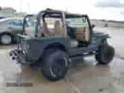 1999 Jeep Wrangler Sahara с VIN 1J4FY49S9XP425310, выставлен на аукционе Copart как лот 64079085 с пробегом 179 730 миль миль и На запчасти • Non repairable. История ставок и продаж доступна на DreamBid. Изображение 3.