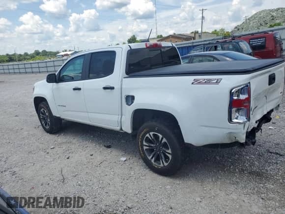 2022 Chevrolet Colorado 2WD Z71 with VIN 1GCGSDEN2N1333502, listed as a Copart auction lot 61370935 with 59,666 mi miles and Salvage title. Bid and sale history available at DreamBid. Image 2.