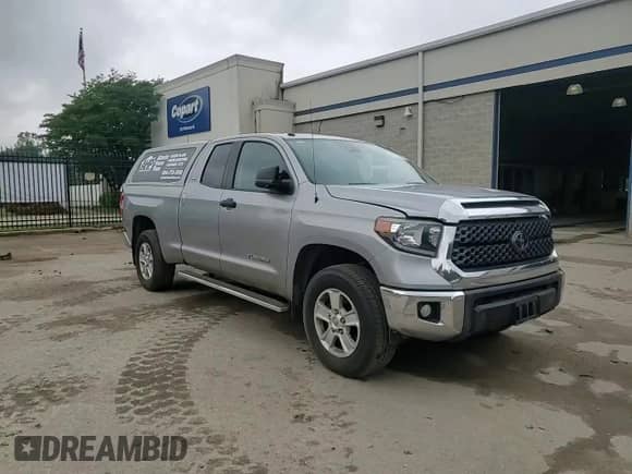 2019 Toyota Tundra SR с VIN 5TFUM5F1XKX081988, выставлен на аукционе Copart как лот 54347595 с пробегом 169 466 миль миль и Списание • Salvage title. История ставок и продаж доступна на DreamBid. Изображение 13.