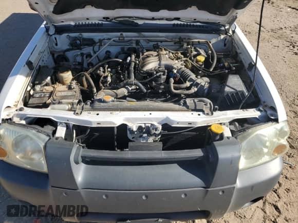 2002 Nissan Frontier XE z VIN 1N6ED26T52C366879, wystawiony jako Copart lot #67726024 z przebiegiem 141 068 mil mil oraz Szkoda całkowita • Salvage title. Historia ofert i sprzedaży dostępna na DreamBid. Obrazek 12.