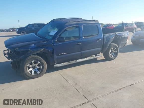 2005 Toyota Tacoma PreRunner with VIN 3TMJU62N75M004880, listed as a IAAI auction lot 43383822 with 198,672 mi miles and . Bid and sale history available at DreamBid. Image 2.