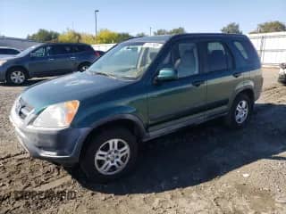 2002 Honda CR-V EX with VIN JHLRD78852C033935, listed as a Copart auction lot 87013695 with 216,301 mi miles and Clean title. Bid and sale history available at DreamBid. Image 1.