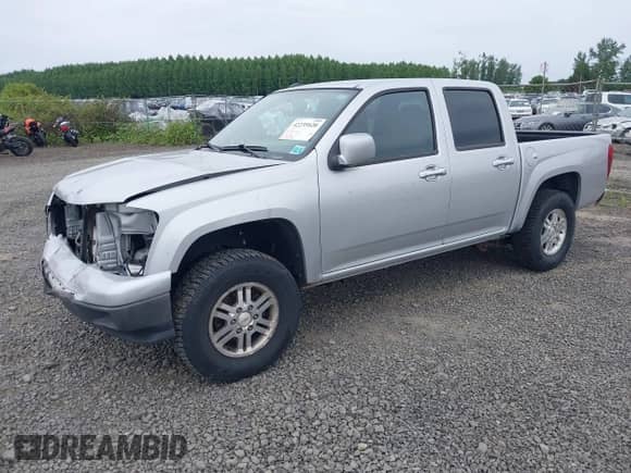 2010 Chevrolet Colorado 1LT z VIN 1GCJTCDEXA8114061, wystawiony jako IAAI lot #42235820 z przebiegiem 218 972 mil mil oraz . Historia ofert i sprzedaży dostępna na DreamBid. Obrazek 2.