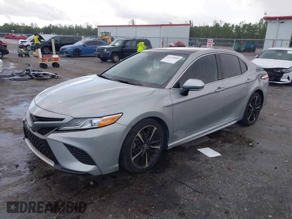2020 Toyota Camry XSE with VIN 4T1K61AK1LU377328, listed as a IAAI auction lot 43224088 with 48,597 mi miles and . Bid and sale history available at DreamBid. Image 2.