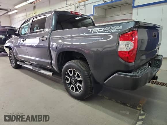 2017 Toyota Tundra Platinum with VIN 5TFAY5F1XHX635000, listed as a Copart auction lot 89438495 with 128,435 mi miles and Salvage title. Bid and sale history available at DreamBid. Image 2.
