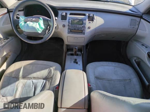 2009 Hyundai Azera GLS z VIN KMHFC46D09A356910, wystawiony jako Copart lot #82407974 z przebiegiem 198 194 mil mil oraz Szkoda całkowita • Salvage title. Historia ofert i sprzedaży dostępna na DreamBid. Obrazek 8.