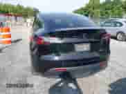 2023 Tesla Model Y Long Range with VIN 7SAYGDEE7PF825882, listed as a IAAI auction lot 42975990 with 44,109 mi miles and . Bid and sale history available at DreamBid. Image 17.
