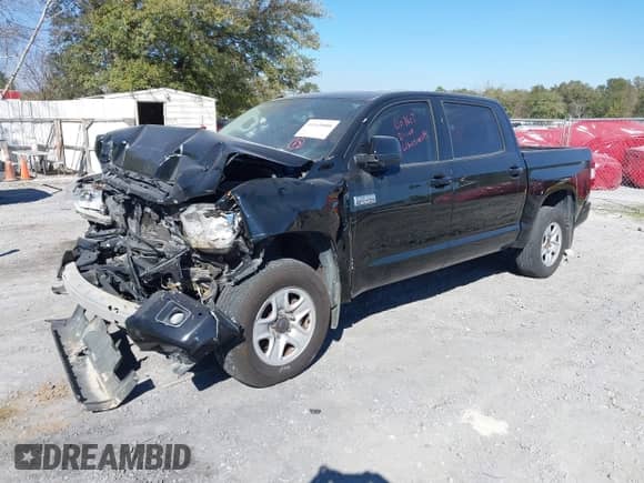 2017 Toyota Tundra Platinum with VIN 5TFAY5F10HX597924, listed as a IAAI auction lot 41169888 with 117,593 mi miles and . Bid and sale history available at DreamBid. Image 2.