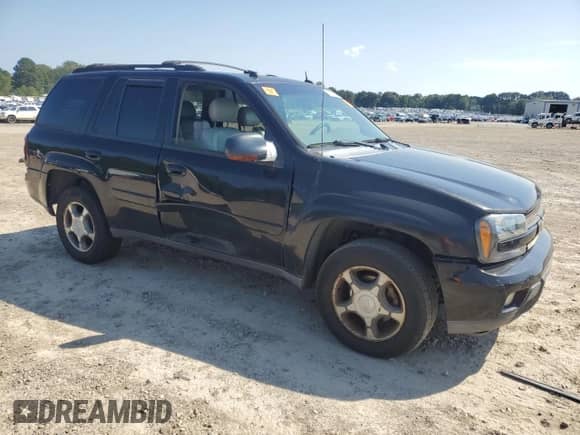 2005 Chevrolet TrailBlazer LT с VIN 1GNDS13S452386147, выставлен на аукционе Copart как лот 69650355 с пробегом 214 407 миль миль и Списание • Salvage title. История ставок и продаж доступна на DreamBid. Изображение 4.