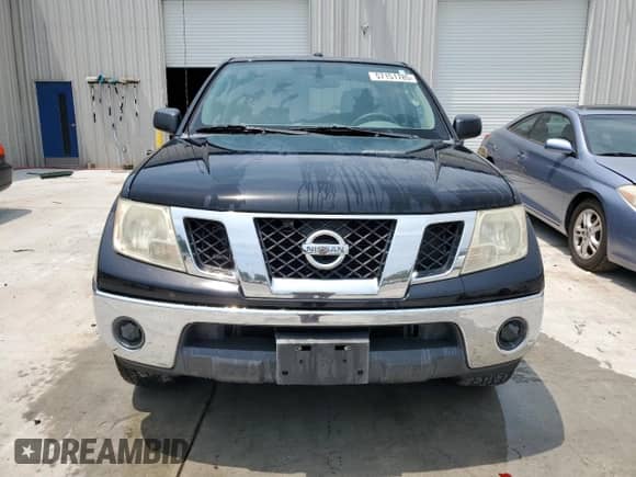 2011 Nissan Frontier SV with VIN 1N6AD0FR0BC400170, listed as a Copart auction lot 57151785 with 235,903 mi miles and Salvage title. Bid and sale history available at DreamBid. Image 5.
