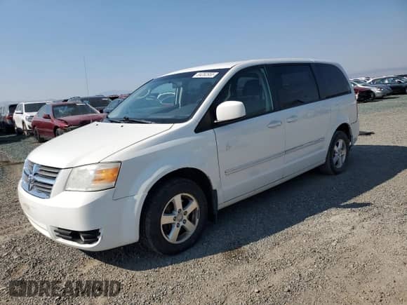 2008 Dodge Grand Caravan SXT z VIN 1D8HN54P38B152672, wystawiony jako Copart lot #84282955 z przebiegiem 128 757 mil mil oraz Czysty tytuł • Clean title. Historia ofert i sprzedaży dostępna na DreamBid. Obrazek 1.