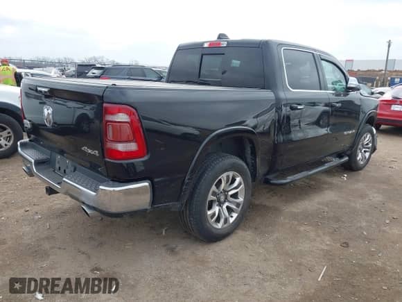 2019 Ram 1500 Longhorn with VIN 1C6SRFKT7KN518337, listed as a IAAI auction lot 41502569 with 76,226 mi miles and . Bid and sale history available at DreamBid. Image 4.