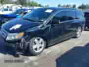 2011 Honda Odyssey Touring с VIN 5FNRL5H96BB056530, выставлен на аукционе IAAI как лот 43349855 с пробегом 207 535 миль миль и . История ставок и продаж доступна на DreamBid. Изображение 2.