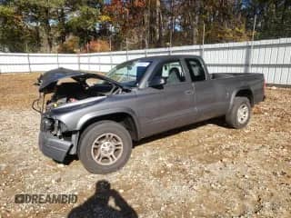 2003 Dodge Dakota with VIN 1D7HL12X43S177207, listed as a Copart auction lot 81048214 with 184,354 mi miles and Salvage title. Bid and sale history available at DreamBid. Image 1.